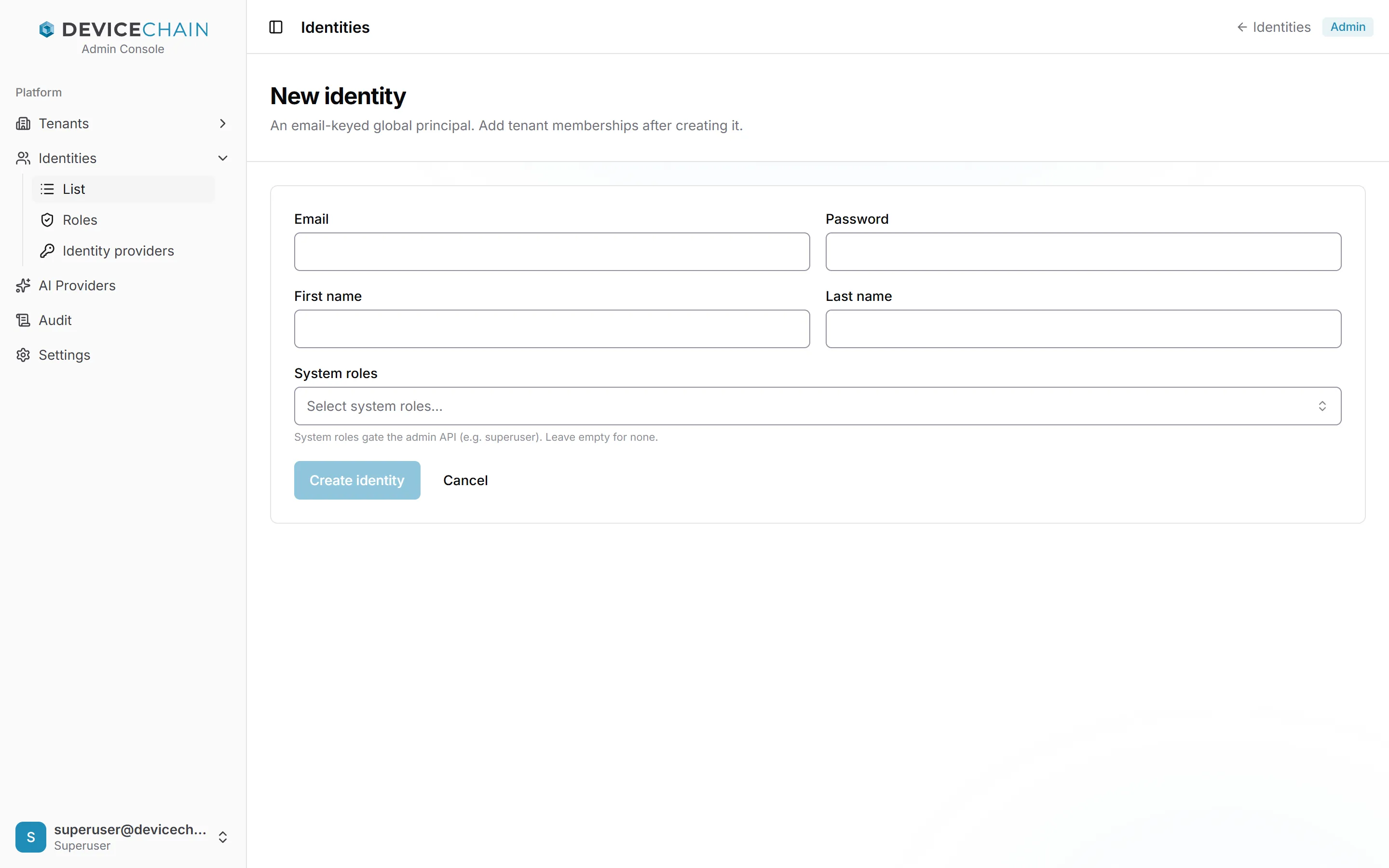 The New identity form, described as an email-keyed global principal, with memberships added after creating it. Fields: Email, Password, First name, Last name and a System roles picker, with Create identity (disabled until filled in) and Cancel buttons.