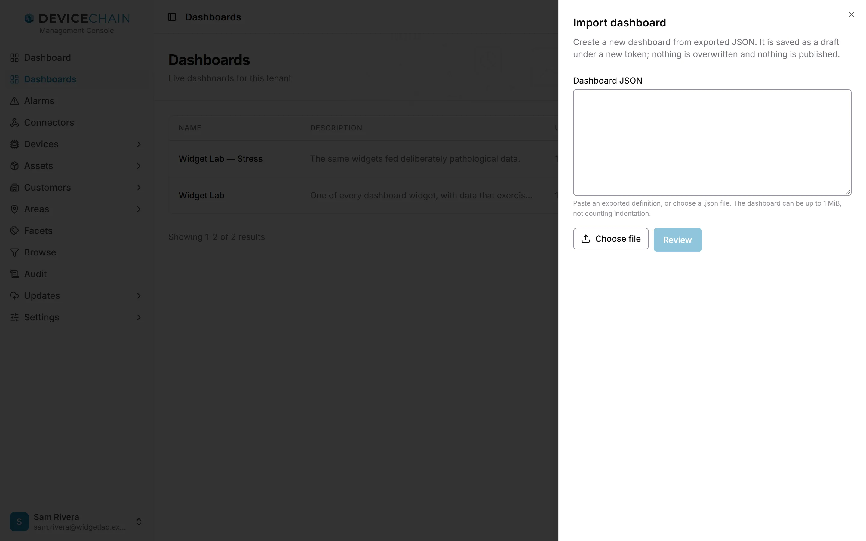 The Import dashboard drawer. It explains that the new dashboard is saved as a draft under a new token, and that nothing is overwritten or published. It has a Dashboard JSON text box, a hint that the dashboard can be up to 1 MiB not counting indentation, and Choose file and Review buttons.