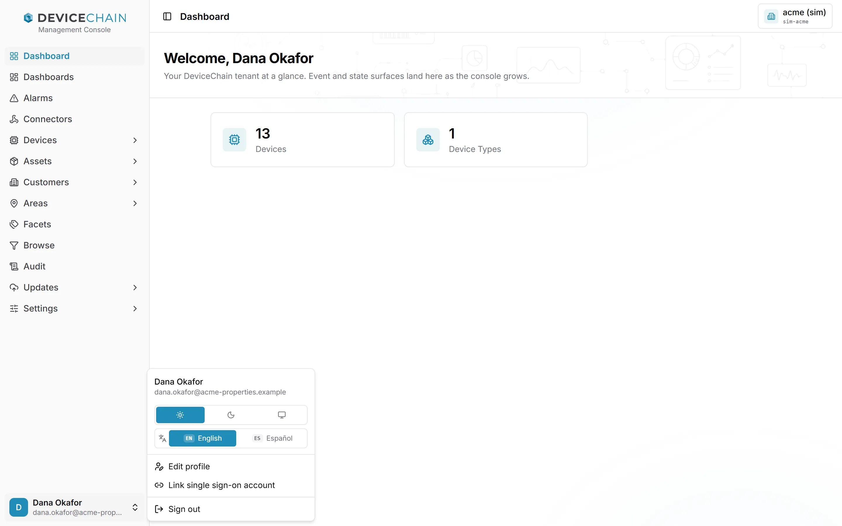 The console home page with the user menu open at the bottom left. The menu shows the user's name and email, a three-way theme control with sun, moon and monitor icons, a language control with English selected and Español, and the items Edit profile, Link single sign-on account and Sign out.