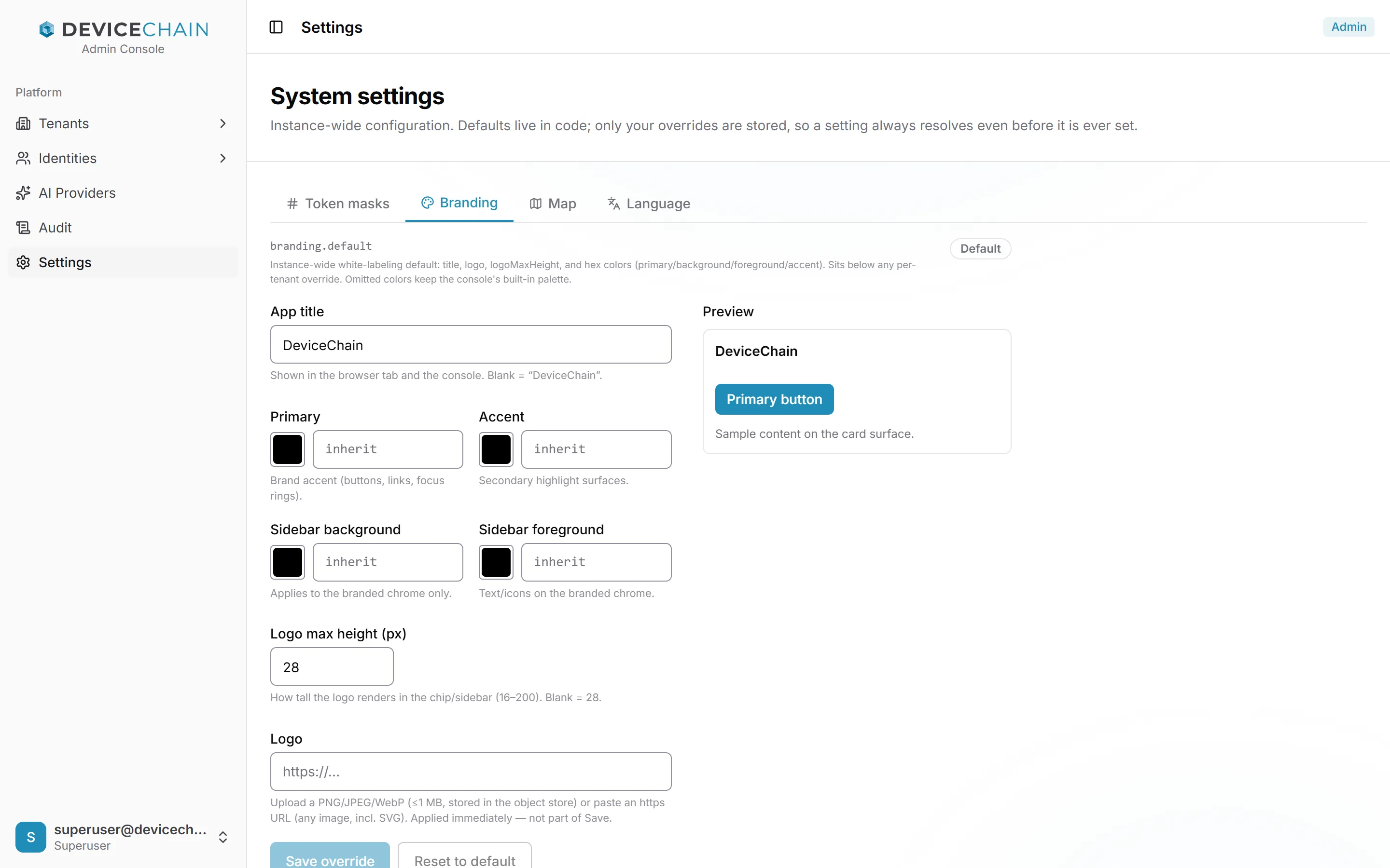 System settings 页面的 Branding 选项卡，选项卡有 Token masks、Branding、Map 和 Language。设置 branding.default 带有 Default 徽章。字段：App title DeviceChain；Primary、Accent、Sidebar background 和 Sidebar foreground 颜色，均显示 inherit；Logo max height 28；以及 Logo 字段，其中是 https:// 占位符，帮助文字介绍了上传或 https 地址。Preview 卡片显示 DeviceChain、一个 Primary 按钮和示例文字。有 Save override 和 Reset to default 按钮。